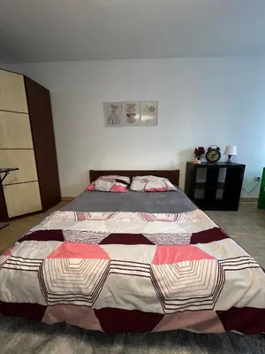 Łóżko lub łóżka w pokoju w obiekcie Stayo Apartments - Warsaw city center