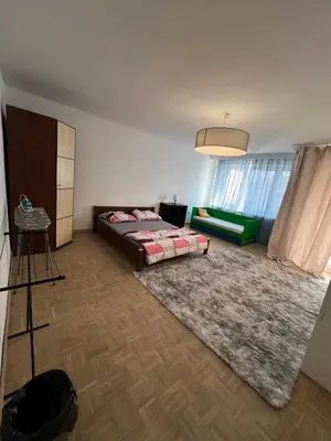 Łóżko lub łóżka w pokoju w obiekcie Stayo Apartments - Warsaw city center