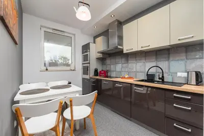 Kuchnia lub aneks kuchenny w obiekcie Kolska 11 by Homeprime