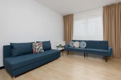 Część wypoczynkowa w obiekcie Spacious Studios Zamoyskiego Near PGE with Parking by Noclegi Renters