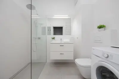 Łazienka w obiekcie Bright Studio Krochmalna Near Warsaw City Centre by Noclegi Renters