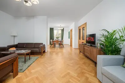 Telewizja i/lub zestaw kina domowego w obiekcie Lumina apartment for family in center Warsaw