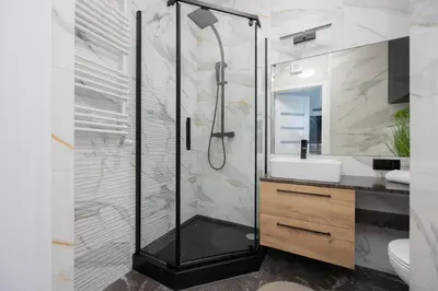 Łazienka w obiekcie Studio in Warsaw with Air Condition & Balcony By Noclegi Renters