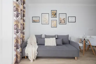 Część wypoczynkowa w obiekcie Studio in Warsaw with Air Condition & Balcony By Noclegi Renters