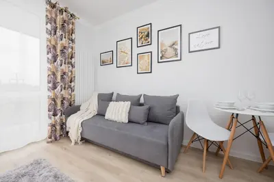 Część wypoczynkowa w obiekcie Studio in Warsaw with Air Condition & Balcony By Noclegi Renters