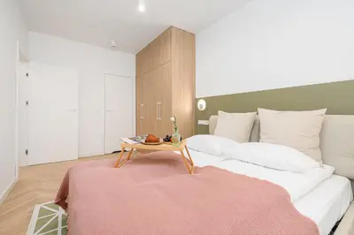 Łóżko lub łóżka w pokoju w obiekcie ShortStayPoland Jagiellońska Premium P6