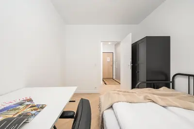 Łóżko lub łóżka w pokoju w obiekcie ShortStayPoland Jagiellońska Premium P6