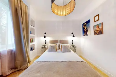 Łóżko lub łóżka w pokoju w obiekcie Vintage Retreat Apartment Mokotow