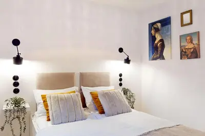 Łóżko lub łóżka w pokoju w obiekcie Vintage Retreat Apartment Mokotow