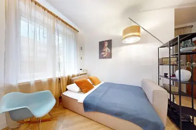 Łóżko lub łóżka w pokoju w obiekcie Vintage Retreat Apartment Mokotow