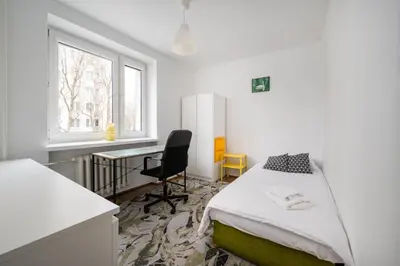 Łóżko lub łóżka w pokoju w obiekcie Mokotów Urban Comfort Apartment by BookingHost