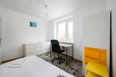Łóżko lub łóżka w pokoju w obiekcie Mokotów Urban Comfort Apartment by BookingHost