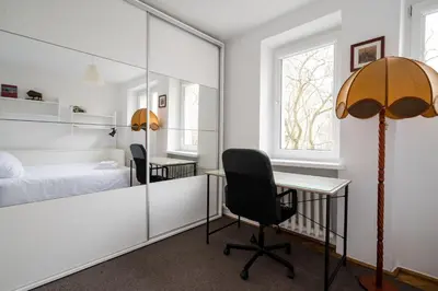 Łóżko lub łóżka w pokoju w obiekcie Mokotów Urban Comfort Apartment by BookingHost