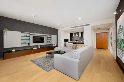 Telewizja i/lub zestaw kina domowego w obiekcie Mokotów Luxury Apartments with Parking Air Conditioning by Renters Prestige