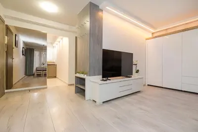 Telewizja i/lub zestaw kina domowego w obiekcie Bonifraterska Apartment
