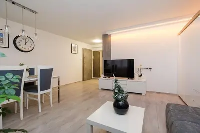 Telewizja i/lub zestaw kina domowego w obiekcie Bonifraterska Apartment