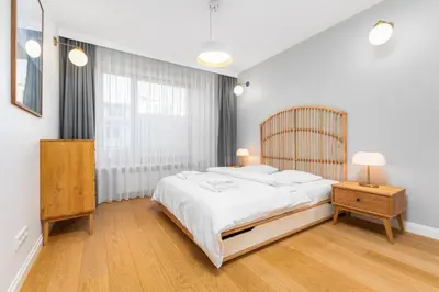 Łóżko lub łóżka w pokoju w obiekcie Premium Apartment Leszczyńska by Your Freedom