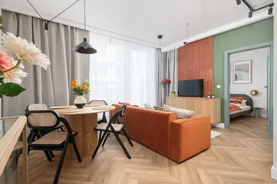 Telewizja i/lub zestaw kina domowego w obiekcie RentPlanet - Apartament przy Dworcu Centralnym