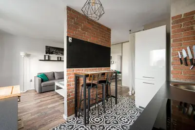 Telewizja i/lub zestaw kina domowego w obiekcie Elbląska Deluxe Apartment by BookingHost