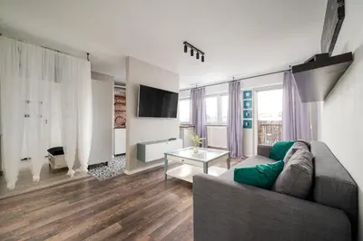 Część wypoczynkowa w obiekcie Elbląska Deluxe Apartment by BookingHost