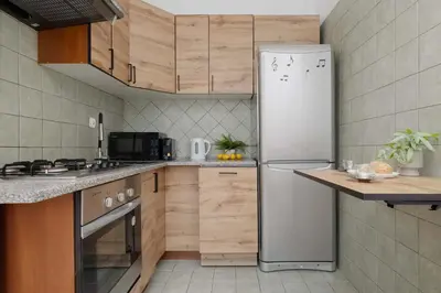 Kuchnia lub aneks kuchenny w obiekcie Old Town Comfort Apartment Near Vistula Boulevards by Noclegi Renters