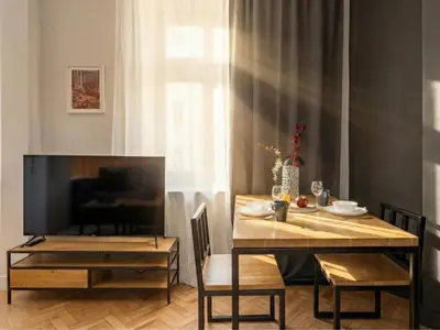 Telewizja i/lub zestaw kina domowego w obiekcie Mokotowska Apartment near US Embassy by Mia