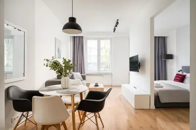 Łóżko lub łóżka w pokoju w obiekcie Wola Sławińska Deluxe Apartment by BookingHost