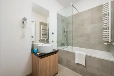 Łazienka w obiekcie Wola Sławińska Deluxe Apartment by BookingHost