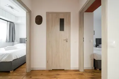 Łóżko lub łóżka w pokoju w obiekcie Bemowo 2-Bedroom Apartment by BookingHost