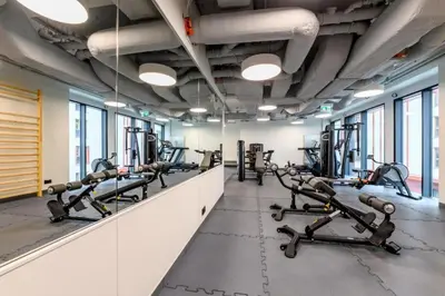 Centrum fitness w obiekcie Towarowa Towers Parking & Gym - 23&24 Floor Sky High Apartments by Downtown Apartments