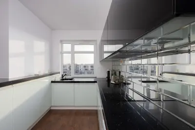 Kuchnia lub aneks kuchenny w obiekcie Avenue Chic Apartment Wilanowska by Solarento