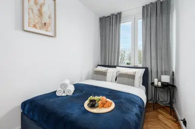 Łóżko lub łóżka w pokoju w obiekcie Lumina 2-room apartment near the Old Town