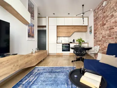 Telewizja i/lub zestaw kina domowego w obiekcie T&M Apartments FVAT Invoice