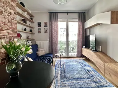 Telewizja i/lub zestaw kina domowego w obiekcie T&M Apartments FVAT Invoice