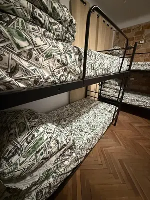 Łóżko lub łóżka w pokoju w obiekcie Hostel PULSE