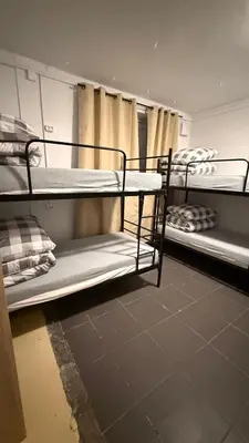 Łóżko lub łóżka w pokoju w obiekcie Hostel PULSE