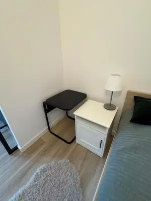 Łóżko lub łóżka w pokoju w obiekcie OCH Studio Warszawa