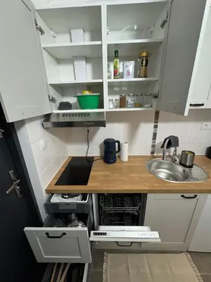 Kuchnia lub aneks kuchenny w obiekcie OCH Studio Warszawa