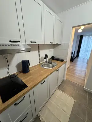 Kuchnia lub aneks kuchenny w obiekcie OCH Studio Warszawa