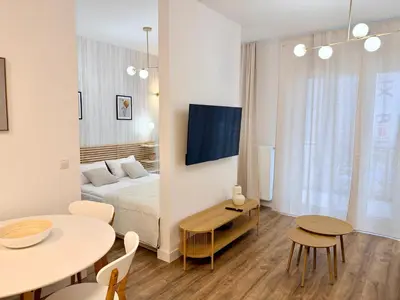 Łóżko lub łóżka w pokoju w obiekcie Wola Urban Oasis by OhMyHome z parkingiem
