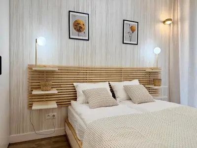 Łóżko lub łóżka w pokoju w obiekcie Wola Urban Oasis by OhMyHome z parkingiem