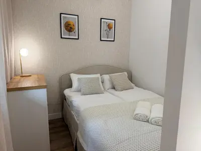 Łóżko lub łóżka w pokoju w obiekcie Wola Urban Oasis by OhMyHome z parkingiem