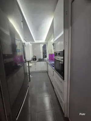 Kuchnia lub aneks kuchenny w obiekcie Apartament Dzielna 78