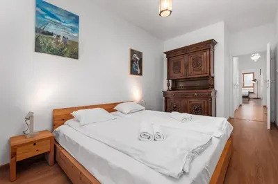 Łóżko lub łóżka w pokoju w obiekcie Ledóchowskiej 5A by Homeprime