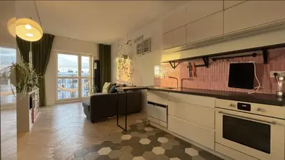 Kuchnia lub aneks kuchenny w obiekcie Cozy Studio with Balcony near Chopin Airport