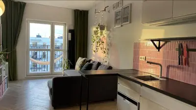 Kuchnia lub aneks kuchenny w obiekcie Cozy Studio with Balcony near Chopin Airport