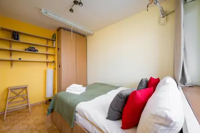 Łóżko lub łóżka w pokoju w obiekcie Solec Powiśle Homely Apartment by BookingHost