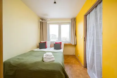 Łóżko lub łóżka w pokoju w obiekcie Solec Powiśle Homely Apartment by BookingHost
