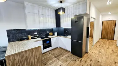 Kuchnia lub aneks kuchenny w obiekcie GOLD APARTAMENT Ząbki