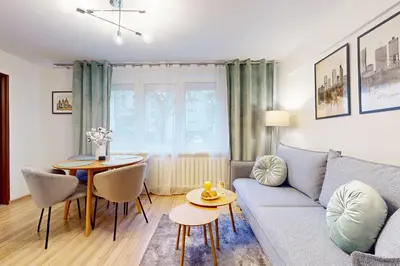 Część wypoczynkowa w obiekcie Greenlight Apartment City Center Jana Pawla II